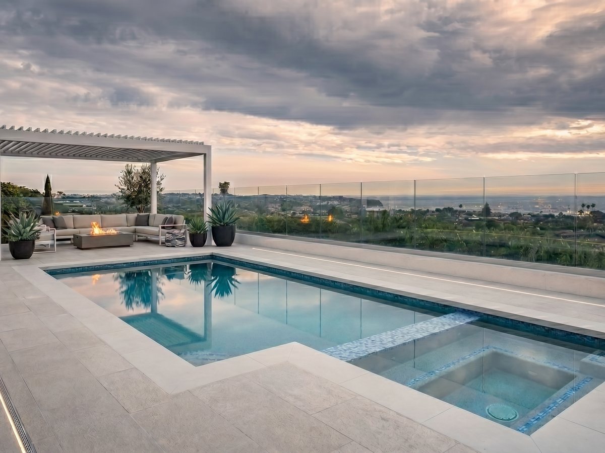 Modern pool and pergola at sunset in South Orange County