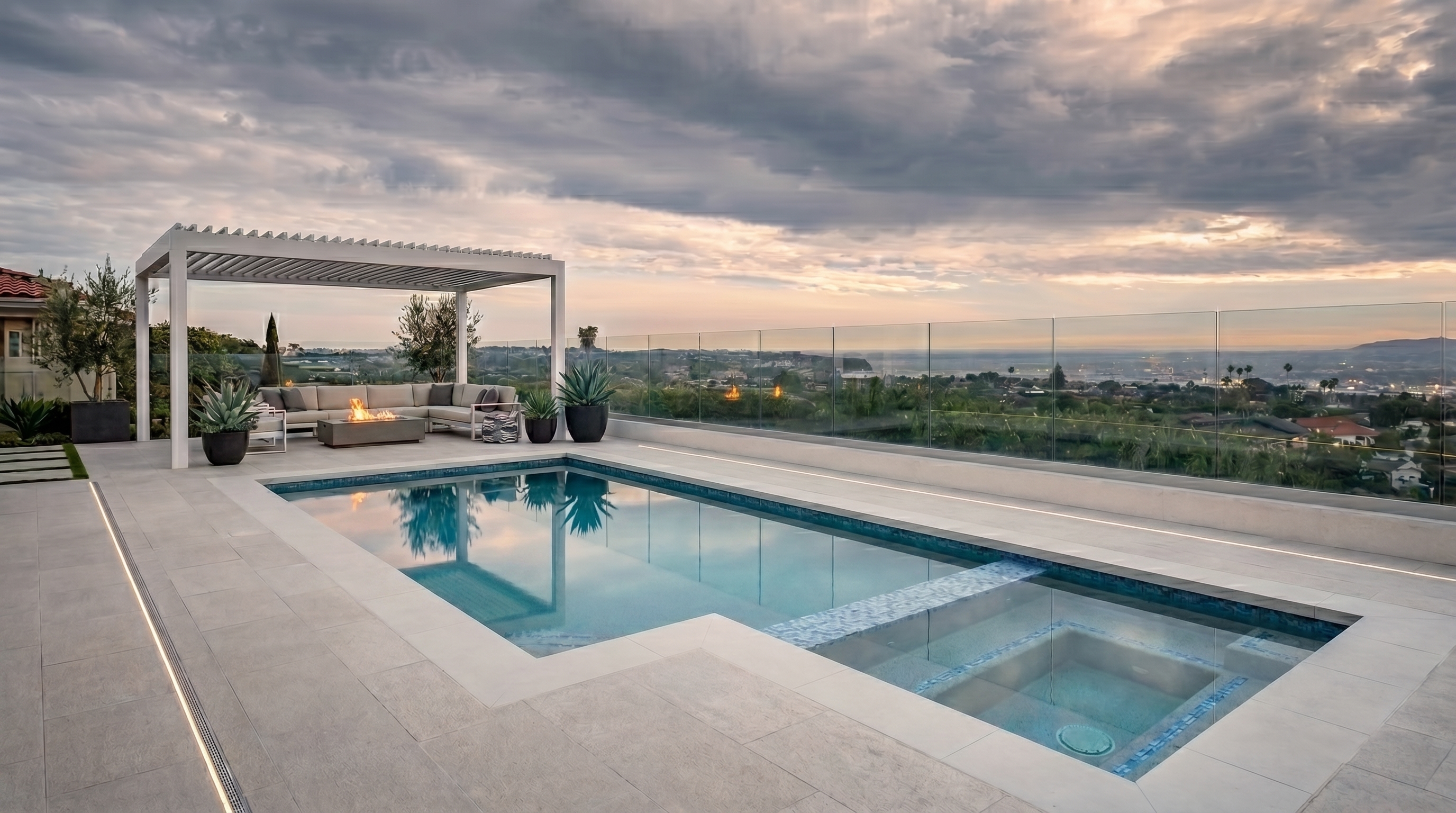 Modern pool with pergola and panoramic sunset views